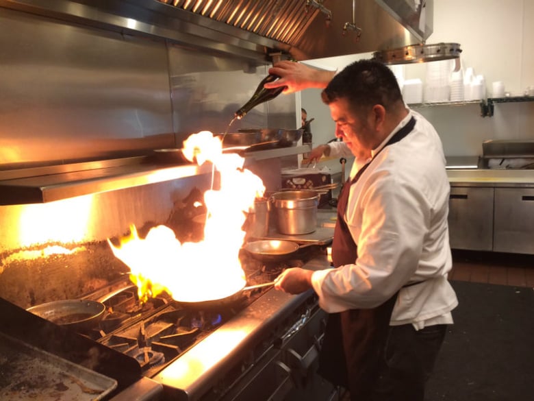 Hector De Vega cooking in the kitchen of De Vega Brothers Restaurant in Stockton.